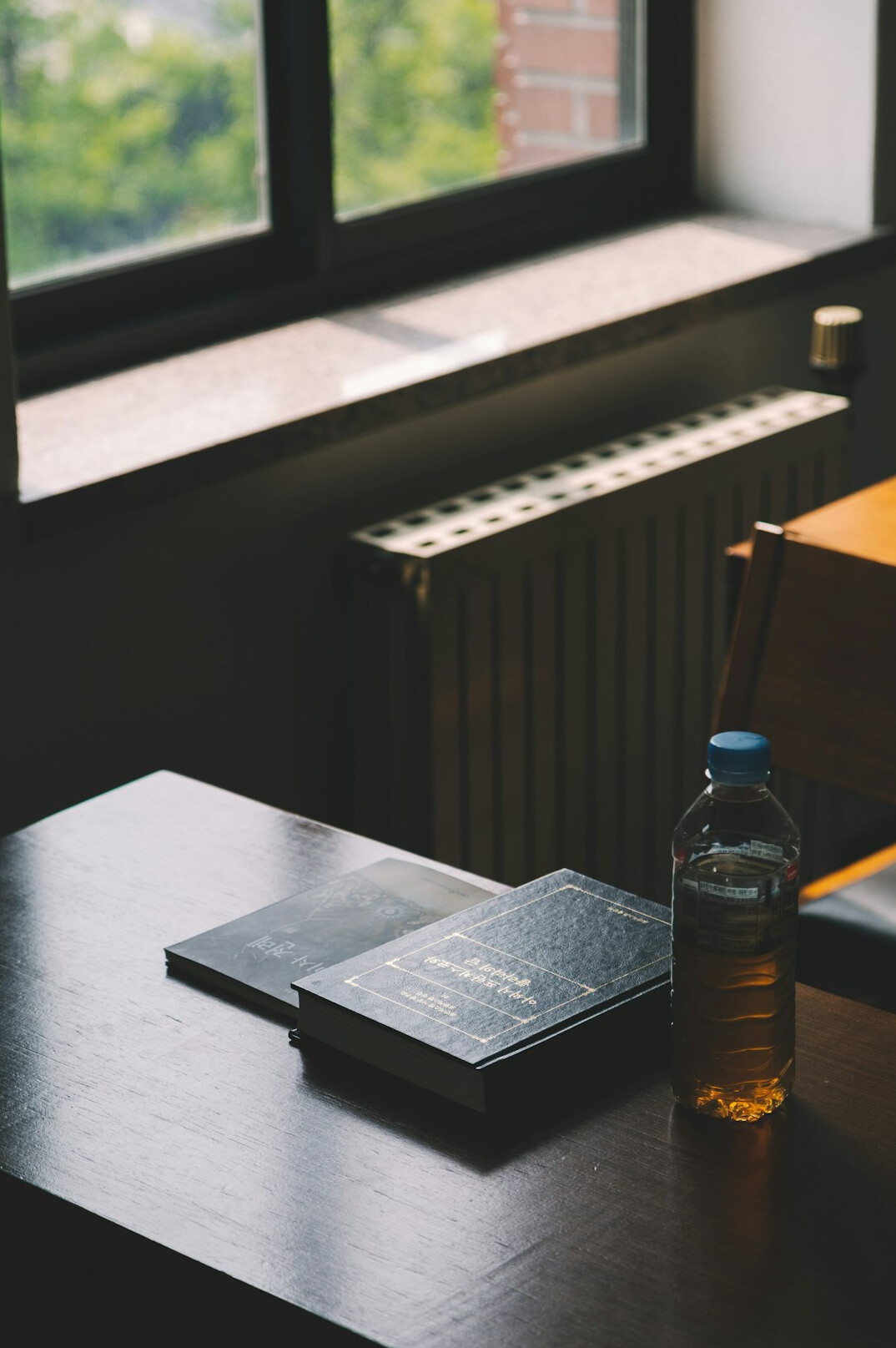 Desk with insurance documents, a laptop and a calculator