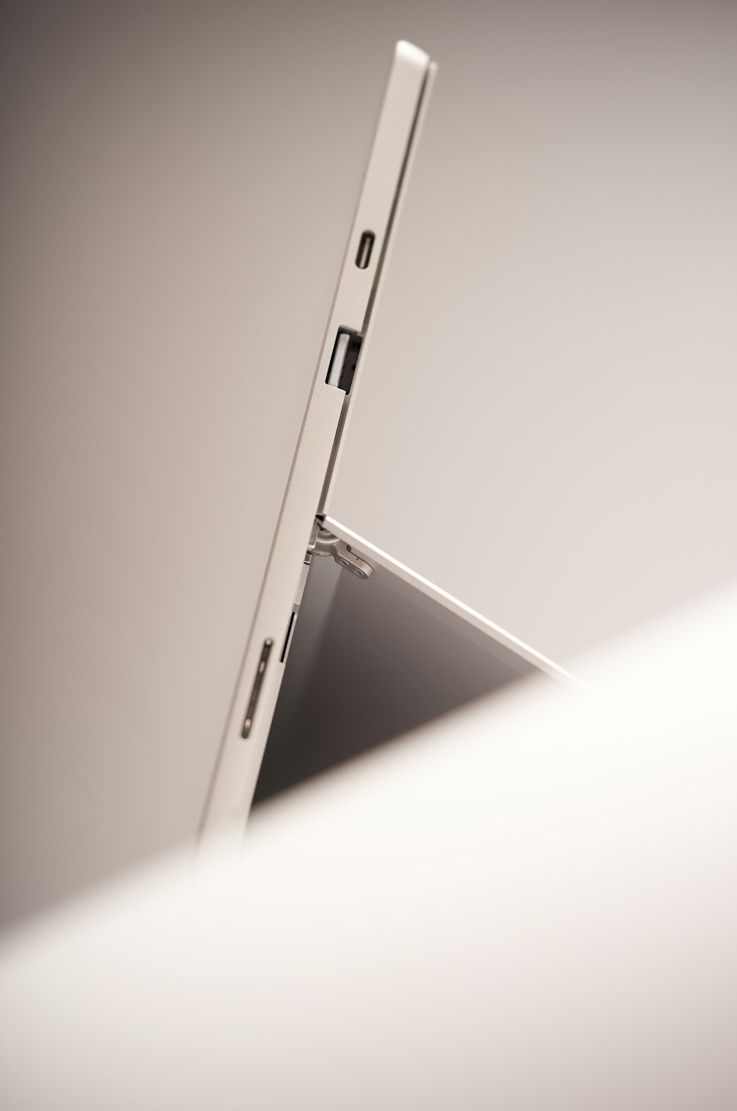 Close-up of a laptop screen showing data charts and graphs